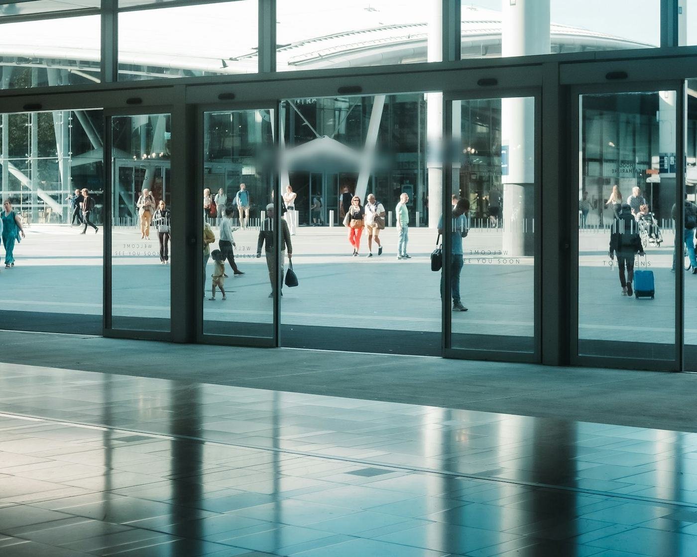 Glass entrance with automatic sliding doors